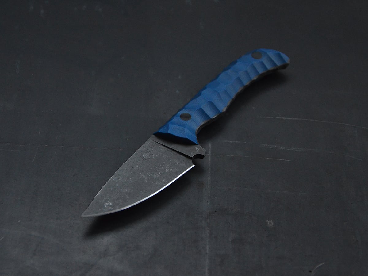 Blue EDC knife with N690 steel and droppoint blade