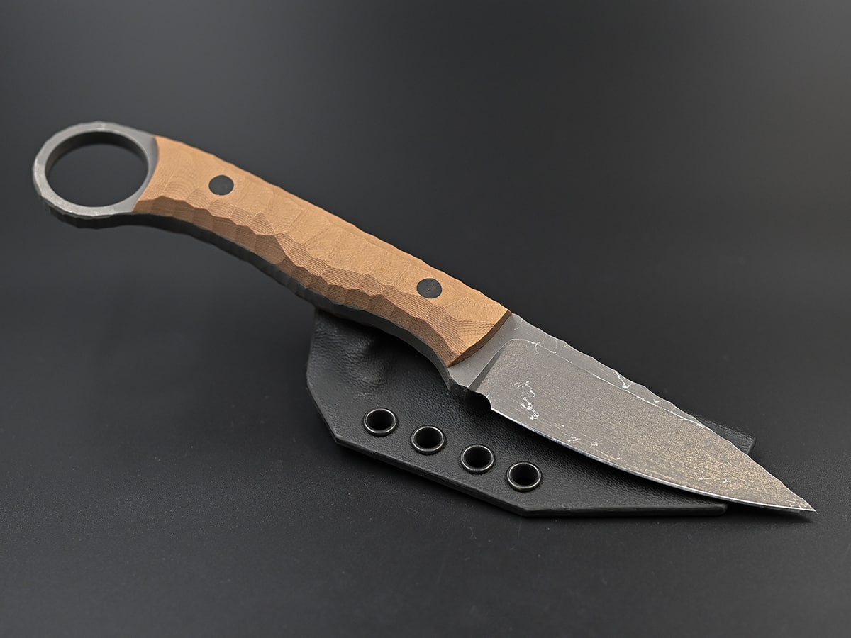 Tactical knife with ring handle and stonewash finish