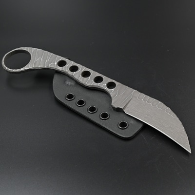 Agressor is a karambit inspired knife with ring handle and without scales.
