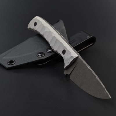 EDC knife Companion 1.0 with a light grey G10 handle